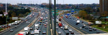 Motor Vehicles and Trucks on a Highway